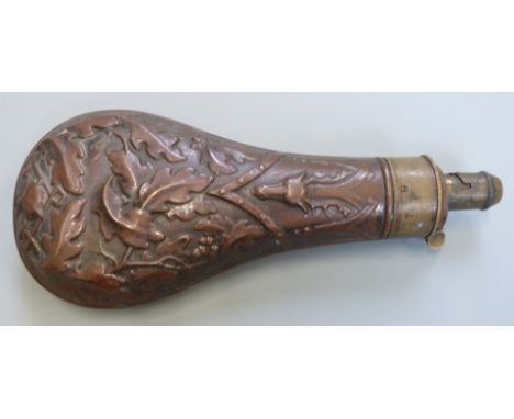 G &amp; JW Hawksley copper and brass powder flask with embossed stags head and oak leaf decoration, 21cm long