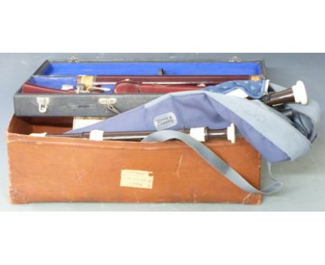 A large collection of whistles and recorders including a cased bass fruitwood soprano, Yamaha treble, Alto tenor, Mohenhauer 