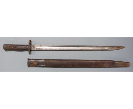 British 1907 WW1 bayonet, Wilkinson to 43cm single edged fullered blade, with scabbard.&nbsp;PLEASE NOTE ALL BLADED ITEMS ARE