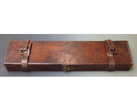 Vintage leather bound gun case with fitted interior and brass lock, 83x23x8cm.&nbsp;