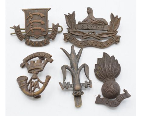 Five British Army Officer's Service Dress badges including Welsh Horse, Essex Regiment, Somerset Light Infantry with Gaunt ma