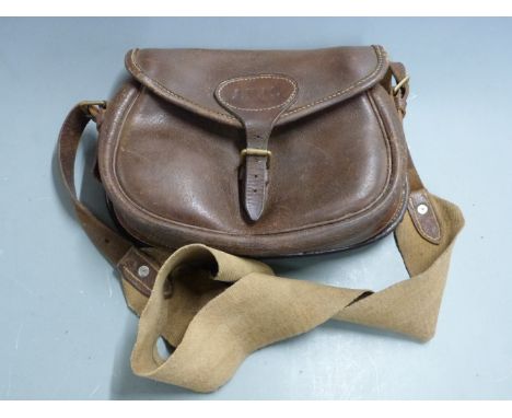 Vintage leather shotgun cartridge bag with canvas shoulder strap.&nbsp;