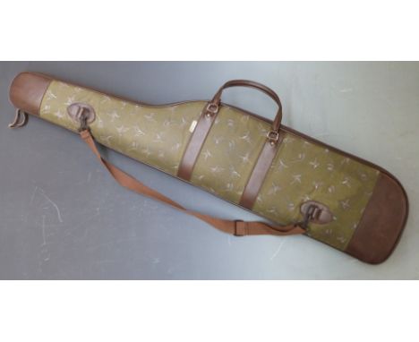 Padded shotgun or rifle slip with decoration of ducks and cartridge bags.&nbsp;