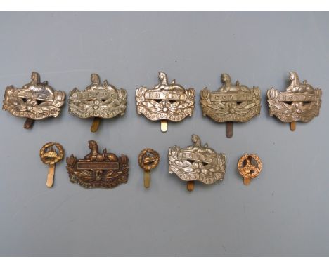 Ten British Army Gloucestershire Regiment metal badges including a Territorial / Volunteer examples with G R Gaunt London to 