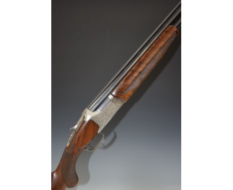 Winchester Grand European 12 bore over and under ejector shotgun with finely engraved locks, underside, trigger guard, top pl