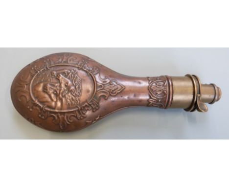 Copper and brass powder flask with embossed decoration of horses to both sides, 21cm long