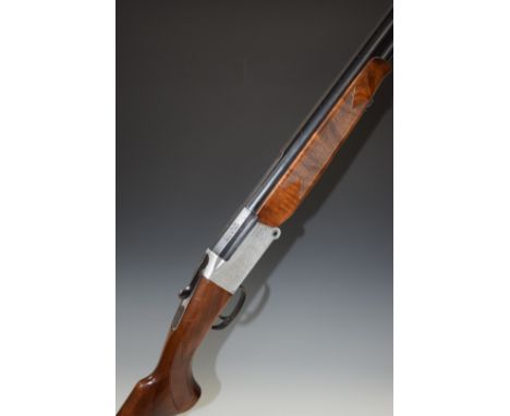 Italian 20 bore over and under shotgun with engraved lock, underside and top plate, chequered semi-pistol grip and forend, si