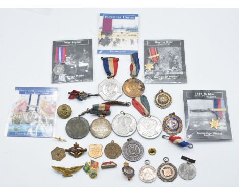 Small collection of medals and badges including Palestine Police 1932-1933, Dowbiggin Cup medal marked 'sterling' to reverse 