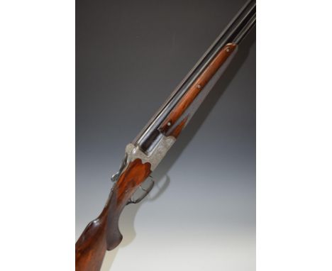 Franz Sodia of Ferlach Austria 12 bore over and under ejector shotgun with cocking indicators, engraved locks, underside, tri