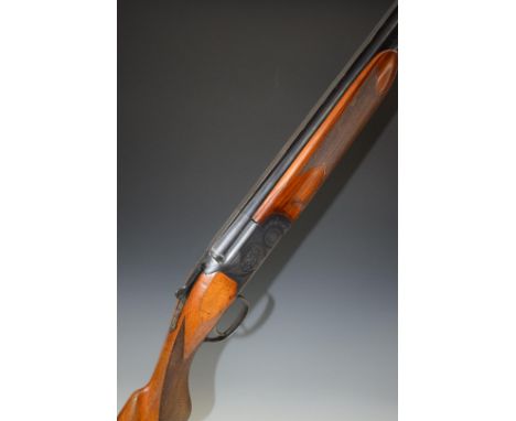 Lames Model 801 12 bore over and under ejector shotgun with engraved scenes of birds to the lock and underside, engraved trig