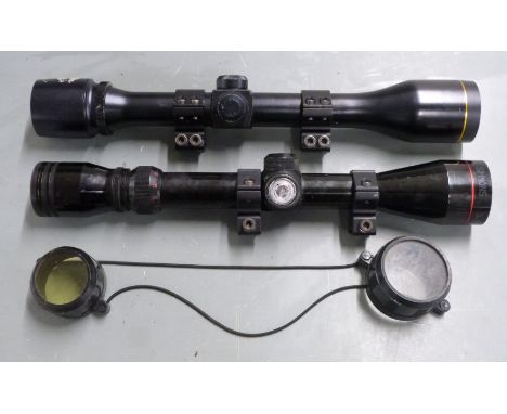 Two rifle scopes Simmons 21029 3-9x40 with scope mounts and lens covers and one other with scope mounts.&nbsp;