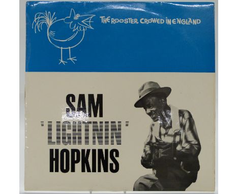 Sam 'Lightnin' Hopkins - The Rooster Crowed In England (77LA12-1) with typed insert, record appears VG with several light lin