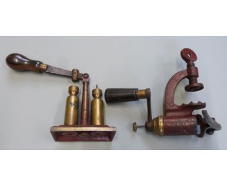 Two G &amp; J W Hawksley type 12 bore shotgun cartridge re-loading tools, one capper and decapper and one rollover tool.&nbsp