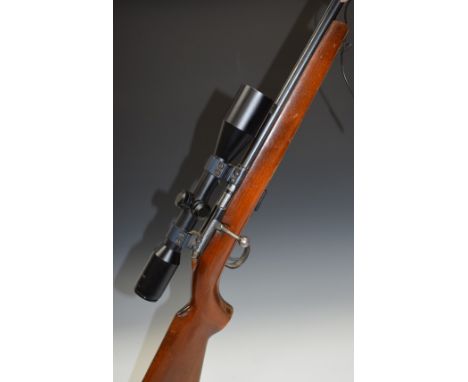 Anschutx 1400.22LR semi-automatic rifle with semi-pistol grip, sling suspension loops, red dot sight, 6x42 scope, sound moder