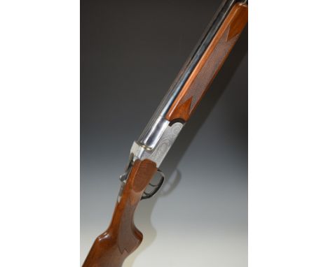 Midland 12 bore over and under shotgun with engraved lock, underside, trigger guard, top plate and thumb lever, chequered sem