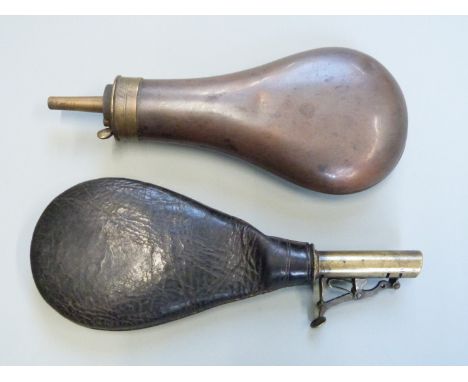 Leather shot pouch together with a copper and brass powder flask, largest 20.5cm long.&nbsp;
