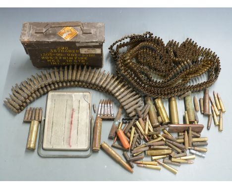 A collection of empty brass rifle cartridges including large calibres some military marked and some linked, drill rounds.&nbs