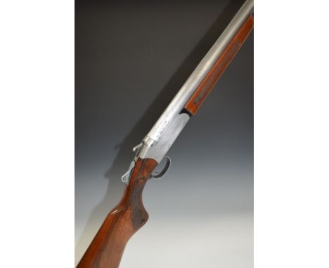 Winchester-Western Cooey Model 840 12 bore single barrelled shotgun with named lock, chequered semi-pistol grip carved with b