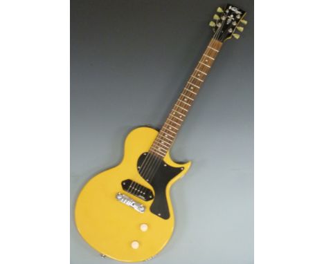 Electric guitar in yellow lacquered finish by Vintage, Wilkinson pick-up&nbsp;