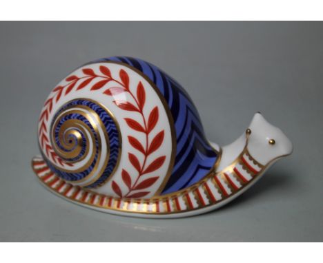 A ROYAL CROWN DERBY PAPERWEIGHT IN THE FORM OF A SNAIL, printed marks to base, no stopper, W 13 cm