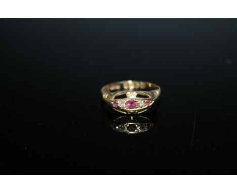 A HALLMARKED 18 CARAT GOLD RUBY AND DIAMOND RING - CHESTER 1918, approx weight 2.2g, ring size O