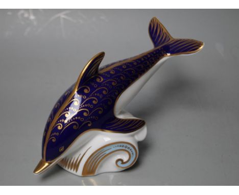 A ROYAL CROWN DERBY PAPERWEIGHT IN THE FORM OF A DOLPHIN, printed marks to base, gold stopper, W 16.5 cm