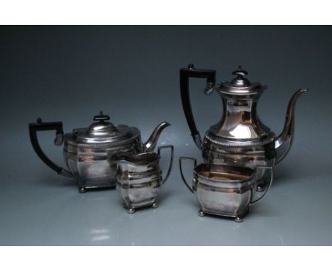 A HALLMARKED SILVER FOUR PIECE TEA AND COFFEE SERVICE BY E H PARKIN & CO - SHEFFIELD 1961, having gadrooned detailing and all