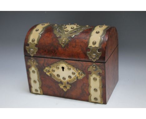 A WALNUT DOME TOPPED TEA CADDY, with ornate brass strap work, W 17.75 cm 