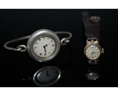 A 9 CARAT GOLD DECO STYLE ACCURIST LADIES WRISTWATCH, Dia 1.5 cm together with a hallmarked silver 'Old England Watches Ltd' 