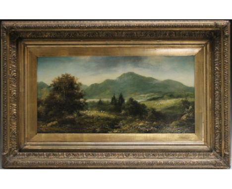 R MARSHALL (XIX-XX).  A mountainous scene with sheep before a lake. signed lower left, oil on canvas, gilt framed, 29.5 x 60 