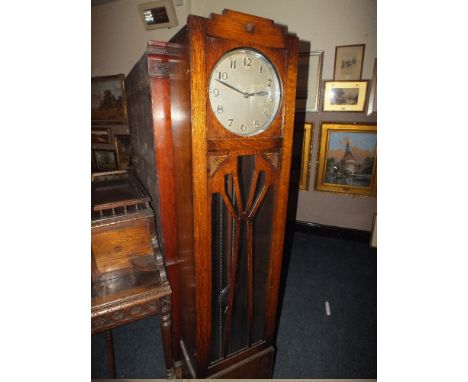 AN OAK CASED ART DECO LONGCASE CLOCK, with triple chrome weights, pendulum, H 185 cm