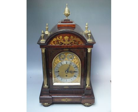 A LARGE VICTORIAN TRIPLE FUSEE TABLE CLOCK STRIKING ON EIGHT BELLS, the rosewood architectural case with brass inlay, reeded 