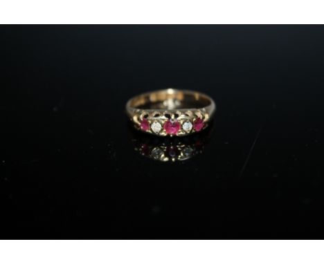 A HALLMARKED 18 CARAT GOLD RUBY AND DIAMOND RING - CHESTER 1916, approx weight 2.2g, ring size N