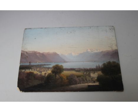A 19TH CENTURY SWISS / ALPINE LANDSCAPE, with figures and buildings before a lake, mountains in the distance, oil on panel, 1