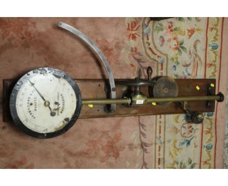 A 'GOOBRAND & Co.' VINTAGE YARN WINDER, mounted on a mahogany panel, L 125 cm