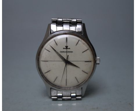 A VINTAGE 'JAEGER LE COULTRE' WRISTWATCH, the dial with hourly baton markers, makers name and logo below the '12' marker, man