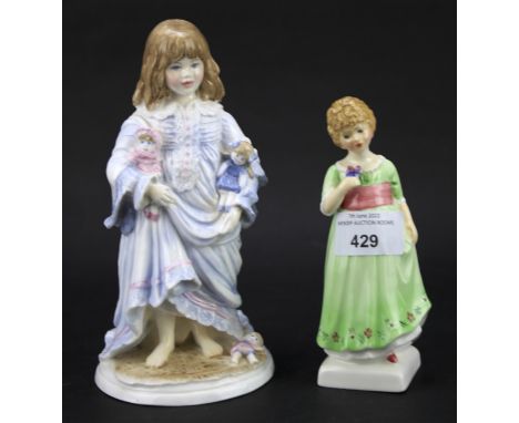 A Royal Worcester figurine 'LULLABY' H29cm and a Royal Doulton figurine 'Tess' HN 2865.