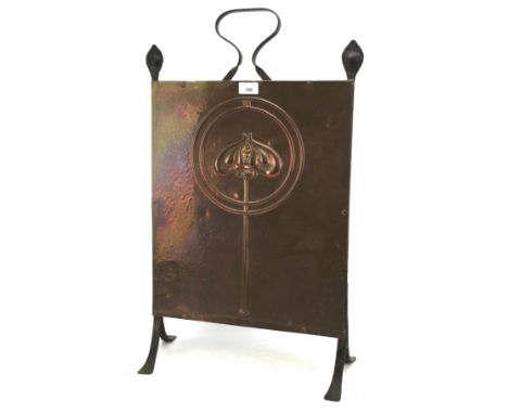 An Art Nouveau embossed copper fire screen. On case metal supports, H71cm 