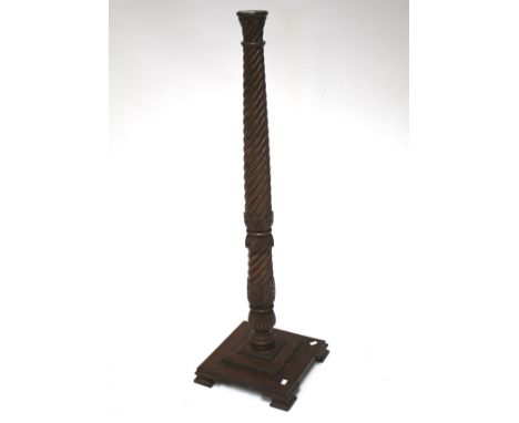 A 19th century mahogany barley twist lamp base. Raised on a stepped square base, H128cm 