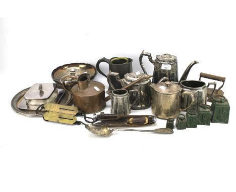 An assortment of 19th and 20th century metalware. Including a tankard, silver plated teapot, pierced tray, a candlestick etc