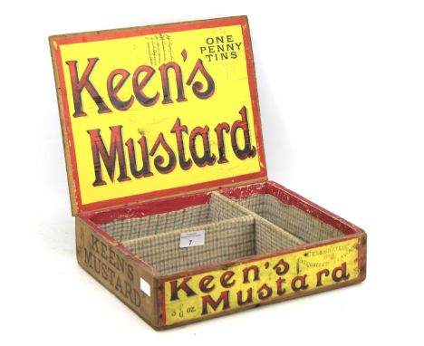 A vintage 'Keen's Mustard' wooden storage box. The interior compartmentalised and lined with fabric, L32cm x D26cm x H8cm