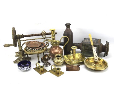 An assortment of collectables. Including brassware, candlesticks, a copper tray, a light, pierced bowl etc