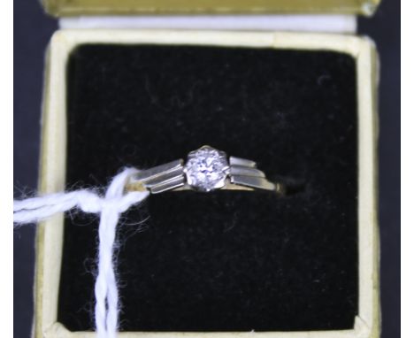 A gold diamond solitaire ring. (The ting down-sized, hallmarks missing). Size K, weight 1.7g