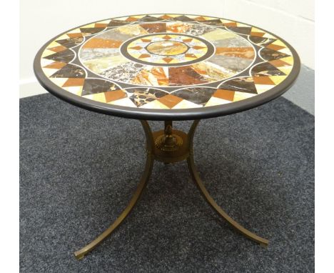 A circular specimen centre-table. The marble inlaid in a radiating geometric design upon a tripod base with sweeping metal su