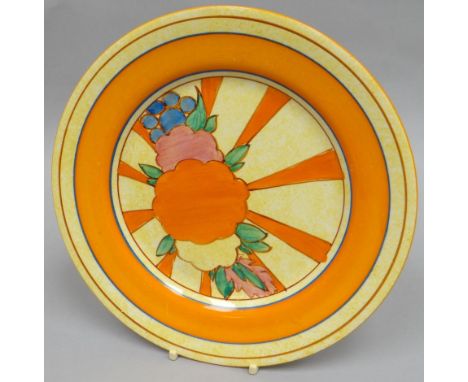 A Clarice Cliff 'Cafe-Au-Lait' display plate in bright orange and yellow glaze, 9 ins diam (23 cms)