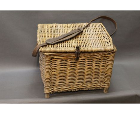 Vintage fishing basket/creel, with leather carrying strap and buckle fastening.  Height 31 cm. 