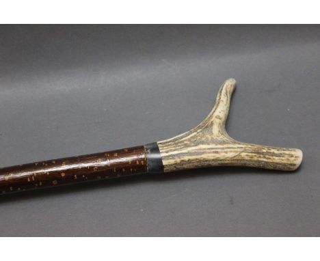 Walking stick with red stag antler handle.  Length 136 cm. 