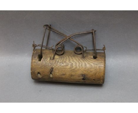 A vintage wooden mole trap, length 15 cm.