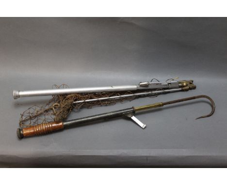 A vintage extending Gaff, stamped made in England with turned wooden handle and an extending folding landing net stamped made