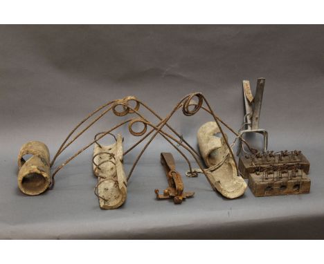 A collection of vintage traps, to include mole tunnel traps, mouse traps etc.